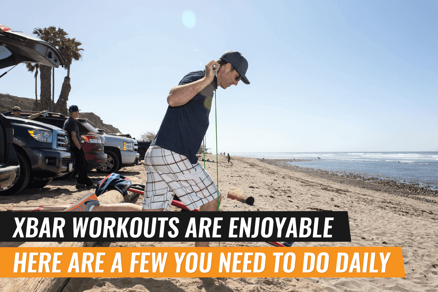 Man performing resistance band workouts with xbar on the beach for an enjoyable fitness routine.