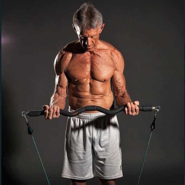 A fit individual using an Exercise Bar for strength training, showcasing the soft grip and swivel feature.